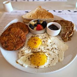 Winemakers Breakfast [sunny side up eggs, herbed hashbrowns, chicken apple sausage, fig jam, buttered sourdough toast, seasonal fruit]
