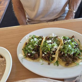 Los 2 Carnales - Streak tacos with onion and cilantro - Mexican Near Me - Oakhurst, California Los 2 Carnales - Streak tacos with onion and cilantro - Mexican Near Me - Oakhurst, California