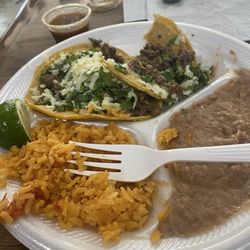 Los Primos - Two tacos Rice and Beans