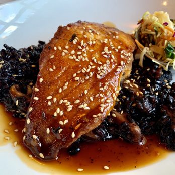 Eureka! - Salmon w shiitake mushroom black rice. A lil salty. - American Near Me - Indian Wells, California