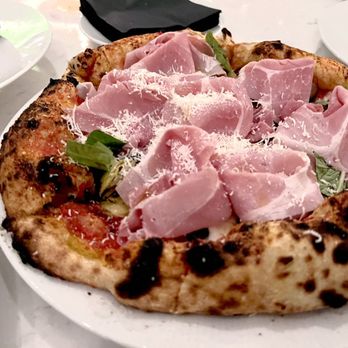 Americano - CAPRICCIOSA
Tomato Sauce, Fior Di Latte, Italian Ham, Black Olives, Artichokes,Mushrooms, EVOO - Wine Bars Near Me - Bayonne, New Jersey Americano - CAPRICCIOSA
Tomato Sauce, Fior Di Latte, Italian Ham, Black Olives, Artichokes,Mushrooms, EVOO - Wine Bars Near Me - Bayonne, New Jersey