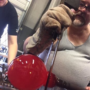 Caliente Hot Glass - Preparing to open the bubble. - Art Galleries Near Me - San Antonio, Texas