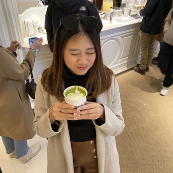 Ralph's Coffee - Happy girl with her matcha - Coffee & Tea Near Me - New York, New York Ralph's Coffee - Happy girl with her matcha - Coffee & Tea Near Me - New York, New York