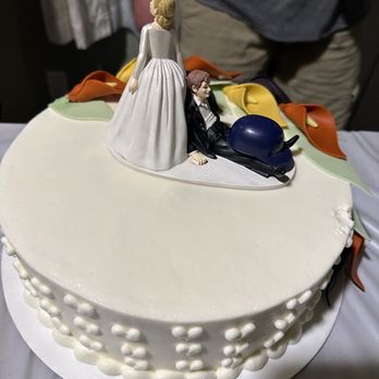Granite Bakery - a bride and groom on top of a wedding cake - Bakeries Near Me - Salt Lake City, Utah Granite Bakery - a bride and groom on top of a wedding cake - Bakeries Near Me - Salt Lake City, Utah