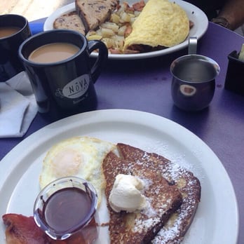 Nova Cafe - Top: Meat lovers omelet with potatoes and toast. Bottom: Kid's French Toast with egg and bacon. - Breakfast & Brunch Near Me - Bozeman, Montana