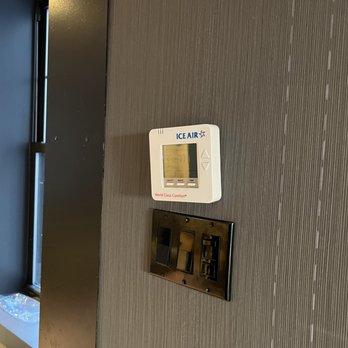 The Time New York - 04/09/2023 Thermostat hanging off the wall - Hotels Near Me - New York, New York The Time New York - 04/09/2023 Thermostat hanging off the wall - Hotels Near Me - New York, New York
