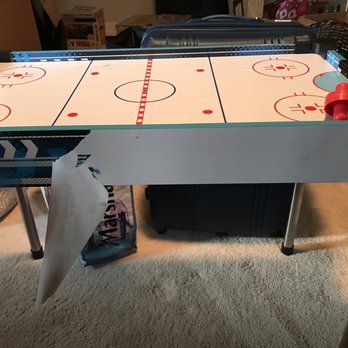 Pick Up Movers - Packing tape applied over stickers which resulted in destroying the game table. - Movers Near Me - Miami, Florida Pick Up Movers - Packing tape applied over stickers which resulted in destroying the game table. - Movers Near Me - Miami, Florida