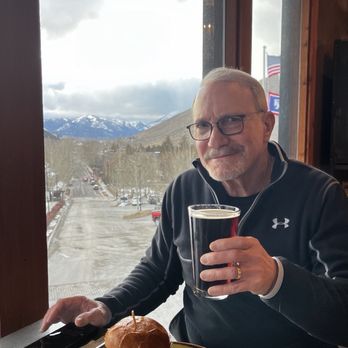 Hayden's Post - Paul holding a cold dark beer before sampling a delicious bison burger at Hayden's Post Restaurant at the Snow King Resort Hotel. - Cocktail Bars Near Me - Jackson, Wyoming Hayden's Post - Paul holding a cold dark beer before sampling a delicious bison burger at Hayden's Post Restaurant at the Snow King Resort Hotel. - Cocktail Bars Near Me - Jackson, Wyoming