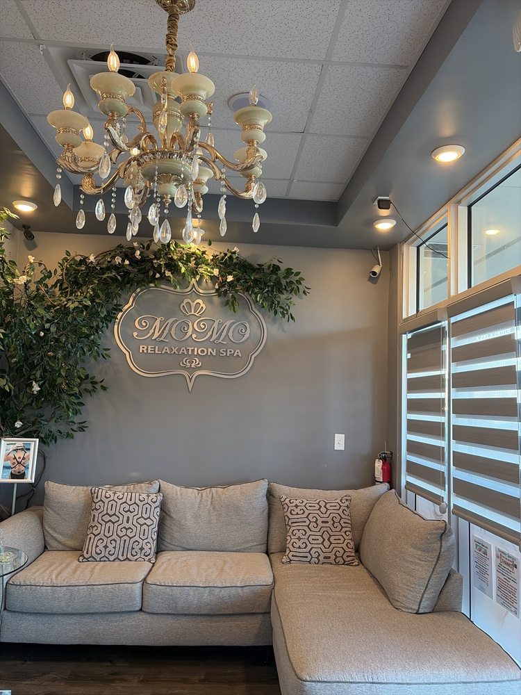 Momo Relaxation Spa Logo