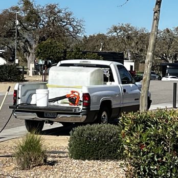 Sun Outdoors Paso Robles - The rig set up with a high pressure washer running. - RV Parks Near Me - Paso Robles, California