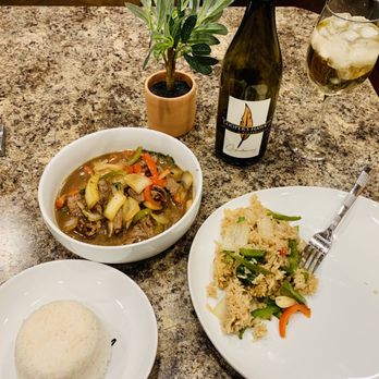 Pearl Cafe - Spicy Basil with beef is in the bowl, with a side of white rice. Spicy Basil fried rice is on the plate. I always get spice level 4. - Thai Near Me - Florissant, Missouri