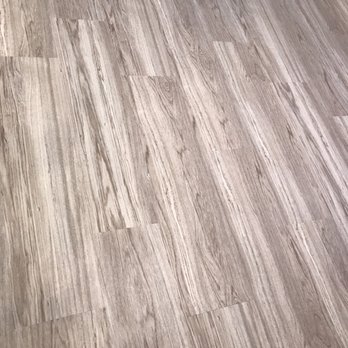 D.E. McNabb Flooring -  a closeup of a wood floor - Carpeting Near Me - Milford, Michigan