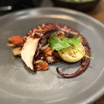 King's Fish House - Pine Ave - (Appetizer menu) Grilled Octopus Caponata with tomato and eggplant. - Seafood Near Me - Long Beach, California King's Fish House - Pine Ave - (Appetizer menu) Grilled Octopus Caponata with tomato and eggplant. - Seafood Near Me - Long Beach, California
