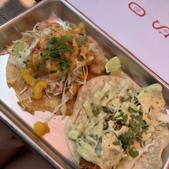 Lonesome Rose - Andersonville - Shrimp taco left ** Taco of the Month ** Flamin' Hot Fried Chicken right - Tex-Mex Near Me - Chicago, Illinois Lonesome Rose - Andersonville - Shrimp taco left ** Taco of the Month ** Flamin' Hot Fried Chicken right - Tex-Mex Near Me - Chicago, Illinois