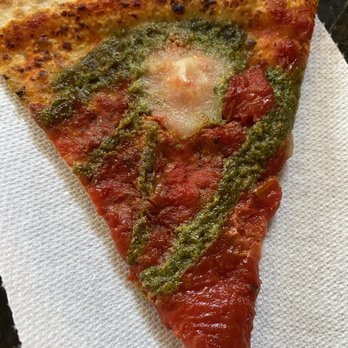 Seasons Pizza - a slice of pizza on a napkin - Pizza Near Me - Wilmington, Delaware Seasons Pizza - a slice of pizza on a napkin - Pizza Near Me - Wilmington, Delaware