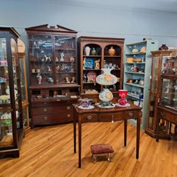 Vintage Treasures - Vendors space with beautiful lamp and glassware