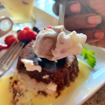 Ruth's Chris Steak House - The chocolate sauce with the whipped cream with the berries with the cake... yum! - Steakhouses Near Me - Pasadena, California