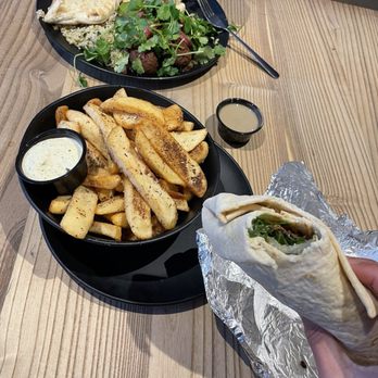 Boychik - Boulder - two plates of food on a table - Middle Eastern Near Me - Boulder, Colorado