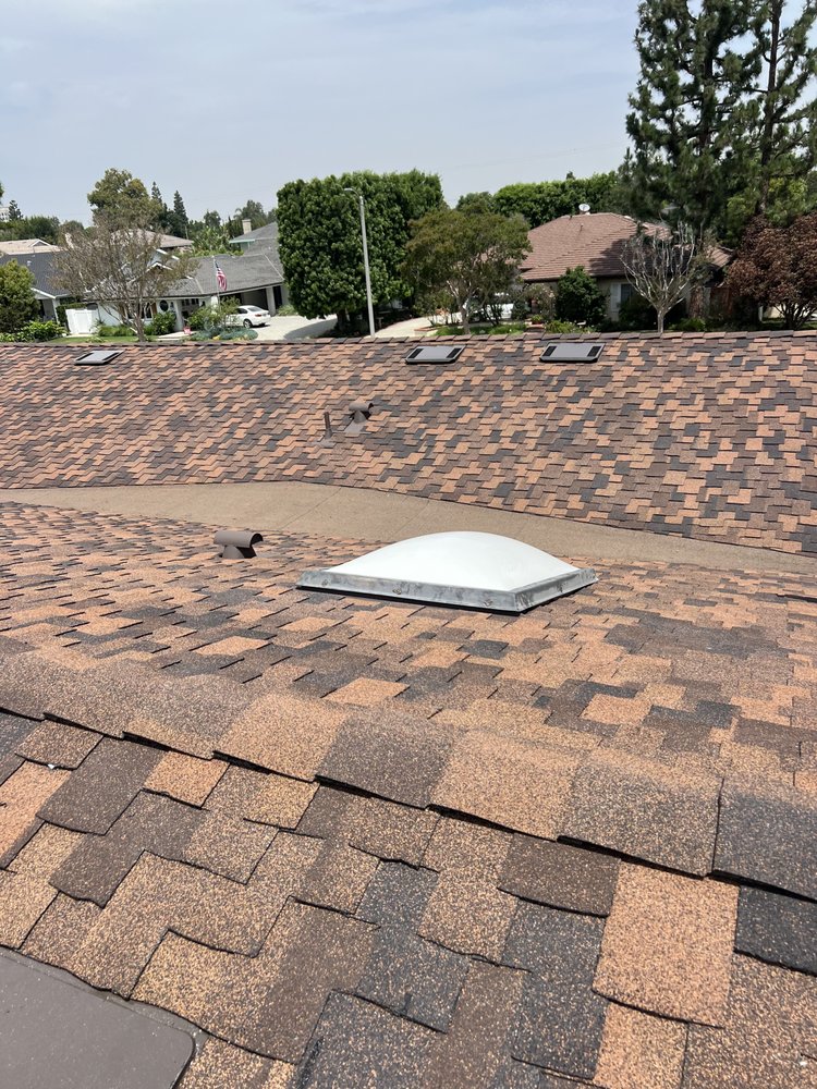 Slide of JVR Quality Roofing