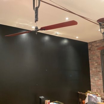 Empire Pro Painters - Living room with black accent wall - Painters Near Me