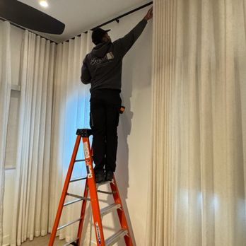 Gotcha Covered Blind & Decorating Center - Installing beautiful floor to ceiling custom drapery - Shades & Blinds Near Me - Raleigh, North Carolina Gotcha Covered Blind & Decorating Center - Installing beautiful floor to ceiling custom drapery - Shades & Blinds Near Me - Raleigh, North Carolina