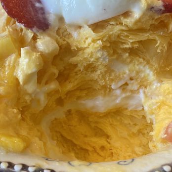 Ever After Tearoom & Eatery - The inside of a mango snow carriage - Shaved Ice Near Me - Irvine, California Ever After Tearoom & Eatery - The inside of a mango snow carriage - Shaved Ice Near Me - Irvine, California