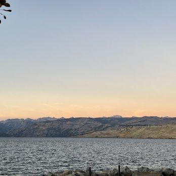 Lakeside - a view of a lake with mountains in the distance - Sports Bars Near Me - Pinedale, Wyoming Lakeside - a view of a lake with mountains in the distance - Sports Bars Near Me - Pinedale, Wyoming