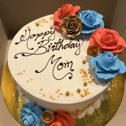 Gourmet Grind - Cake upon pick-up. Love the colors, the font, and the accent pieces. Whipped cream decor.