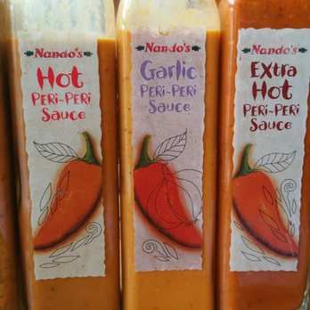 Nando's Peri-Peri - Here's some of the sauces you can pick from! - South African Near Me - Oakbrook, Illinois