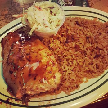 Flanigan's - Pompano Beach - Grilled salmon with toasted sesame glaze, dirty rice and slaw - American Near Me - Pompano Beach, Florida Flanigan's - Pompano Beach - Grilled salmon with toasted sesame glaze, dirty rice and slaw - American Near Me - Pompano Beach, Florida