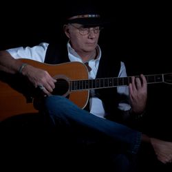Gibson - During a performance playing my Martin D-45...