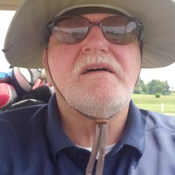 Grizz Man playing Golf