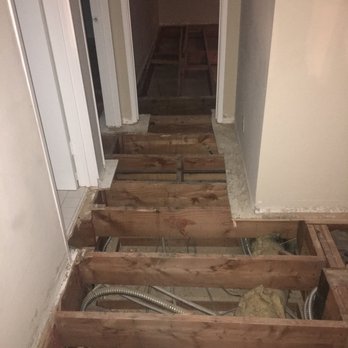 Floor Zone - After demo and ripping old and bowing plywood - Flooring Near Me