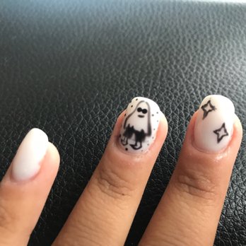 Studio Nails & Spa - The pinky nail isn't fully filled and the star shape is smudged. In between the ghosts legs, there is a smudge line. - Nail Salons Near Me - Orange, California Studio Nails & Spa - The pinky nail isn't fully filled and the star shape is smudged. In between the ghosts legs, there is a smudge line. - Nail Salons Near Me - Orange, California