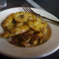 Skillet - Fingerling potatoes with rosemary and burnt ends.
