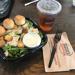 Caesars salad with delicious rosemary olive oil bagel bites and ices tea