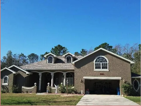 Slide of Tom Sawyer Roofing