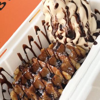 Cowtown Creamery - Belgium waffle with vanilla ice cream on the side with chocolate drizzle. - Ice Cream & Frozen Yogurt Near Me
