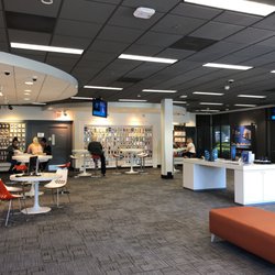 AT&T Store - As customers are waiting, this staff member takes her time talking about her upcoming wedding. In 1.5hours, they serviced only 1 customer.