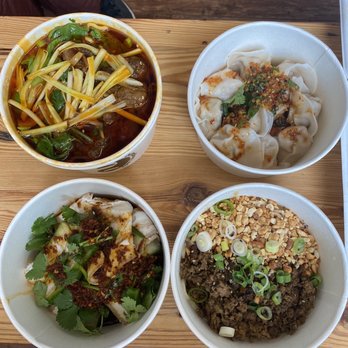 The Dumpling Lady - From top left: Nei Jiang beef noodle soup, Chicken and shrimp dumpling, pork belly with garlic, and Dandan noodle. - Szechuan Near Me - Charlotte, North Carolina The Dumpling Lady - From top left: Nei Jiang beef noodle soup, Chicken and shrimp dumpling, pork belly with garlic, and Dandan noodle. - Szechuan Near Me - Charlotte, North Carolina