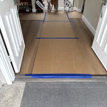 Terry Moving & Storage - Cardboard runners were placed over our new flooring to prevent damage - Movers Near Me - Lake Forest, California