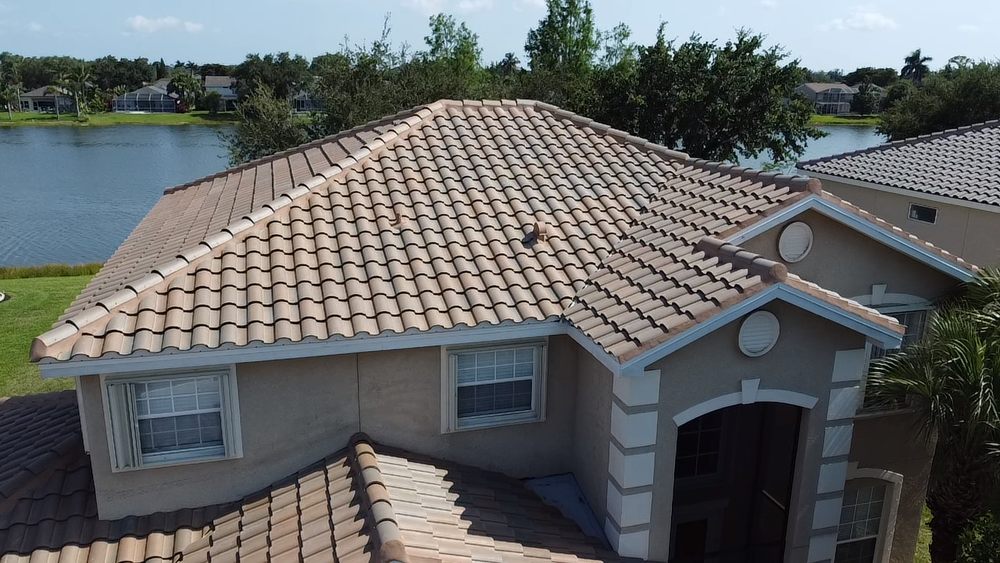 Slide of D’ Roofing Group