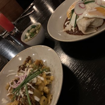 Mayan Cafe - Chilaquiles (con chorizo) on the left, veggie burrito on the right. - Latin American Near Me - Louisville, Kentucky