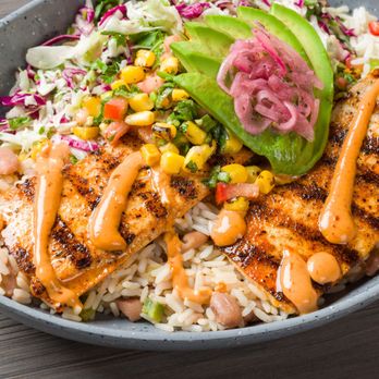 California Fish Grill - Mahi Mahi Bowl Cali-Style, grilled Mahi, white rice, beans, diced chili mix, with avocado corn salsa, chipotle aioli & pickled onions. - Seafood Near Me - Long Beach, California California Fish Grill - Mahi Mahi Bowl Cali-Style, grilled Mahi, white rice, beans, diced chili mix, with avocado corn salsa, chipotle aioli & pickled onions. - Seafood Near Me - Long Beach, California