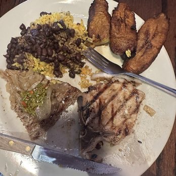 Cuba 512 - Half of chuletas, and churassca steak with maduras as a side - Caribbean Near Me - Austin, Texas Cuba 512 - Half of chuletas, and churassca steak with maduras as a side - Caribbean Near Me - Austin, Texas