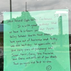 Apple Valley Natural Foods - Front door sign that says they have permanently closed.