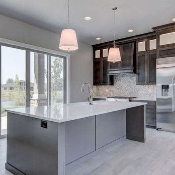 Huntwood - kitchen with stainless steel appliances and large windows - Cabinetry Near Me - Boise, Idaho Huntwood - kitchen with stainless steel appliances and large windows - Cabinetry Near Me - Boise, Idaho