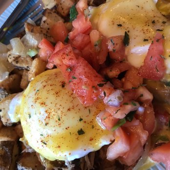 My Cafe - A Kalua pig and lomi with eggs benedict with thick sliced and toasted sourdough baguette, homemade hollandaise sauce's & breakfast potatoes. - Breakfast & Brunch Near Me - Kapolei, Hawaii My Cafe - A Kalua pig and lomi with eggs benedict with thick sliced and toasted sourdough baguette, homemade hollandaise sauce's & breakfast potatoes. - Breakfast & Brunch Near Me - Kapolei, Hawaii