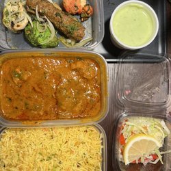 The Bay Leaf - Takeaway meal: top is the tandoori mix platter, middle is lamb vindaloo curry and garlic fried rice on the bottom