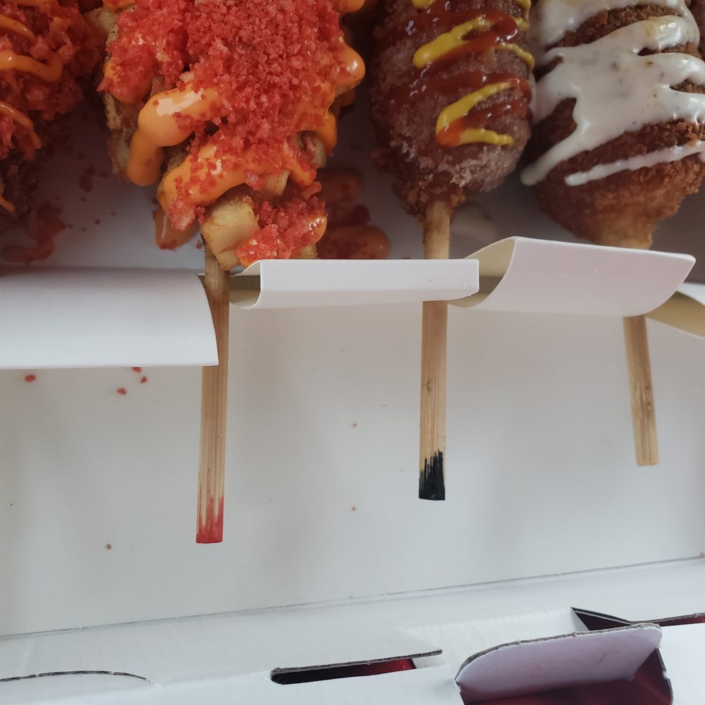 Two Hands Seoul Fresh Corn Dogs - colors of the end of sticks tell you the inside of corn dog - Fast Food Near Me - Mesa, Arizona Two Hands Seoul Fresh Corn Dogs - colors of the end of sticks tell you the inside of corn dog - Fast Food Near Me - Mesa, Arizona